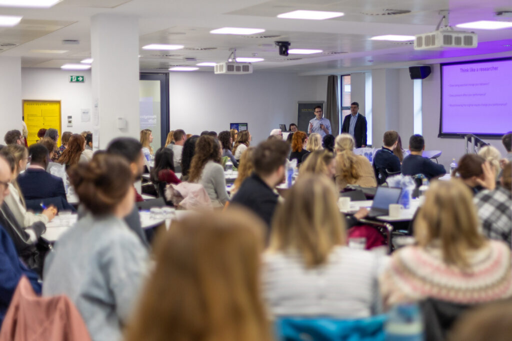 Image of students sitting at tables, watching speakers at the INSIGHT Yorkshire and Humber Conference 2026