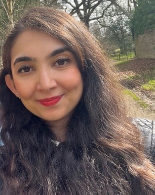 Farnaz Moghimi, smiling at the camera
